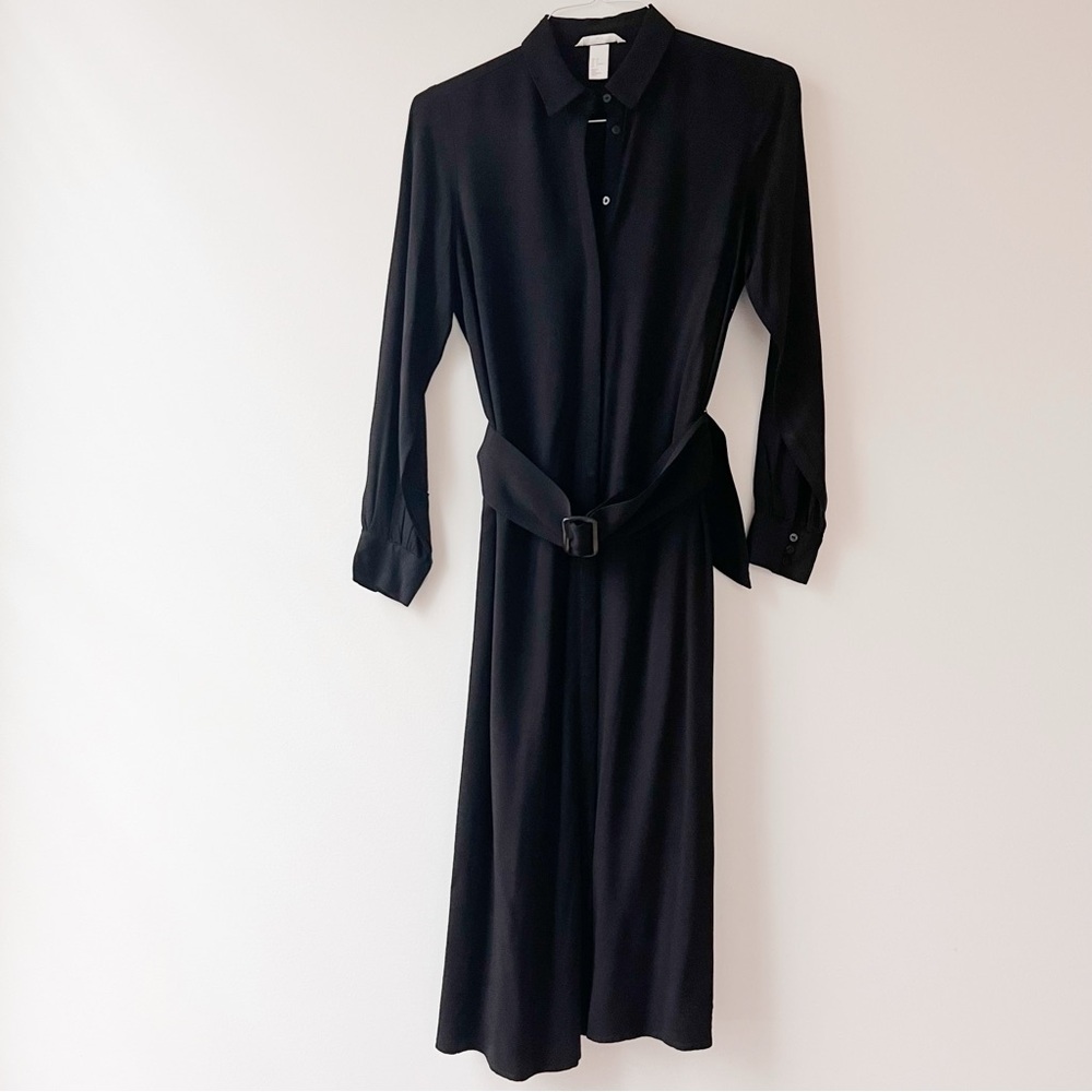 This a black H&M midi dress with a belt!